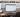 AI-generated illustration of a TV used as a computer monitor, highlighting text clarity, PC Mode and desk placement.