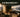 Projector Brightness: ANSI, ISO Lumens, Room Light and Image Size — AI-generated illustrative Hong Kong scene; not an exact product photograph.