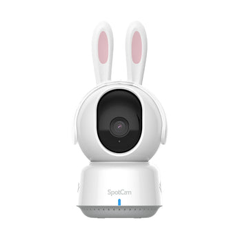 白色 SpotCam BabyCam Pro 雲台攝影機,戴住粉紅色內襯嘅兔仔耳朵