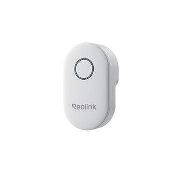 White Reolink Chime with round button, angled view
