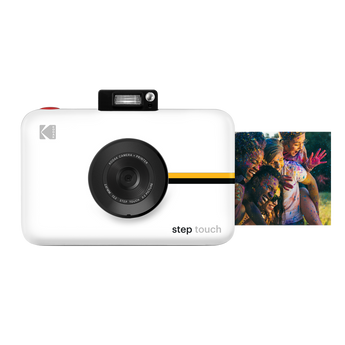 White Kodak Step Touch, front view with flash raised and a colourful 2x3 group photo beside it