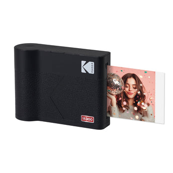 All-black Kodak Mini 3 ERA printer with a square print coming out of the side