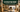 AI concept cover of warehouse aisles and receiving area, titled 倉庫監控點規劃？ / Warehouse CCTV Guide.