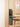DL05 fitted on a light wooden door, keypad lit and fingerprint reader on the lever handle