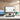 BK60 in front of a monitor, laptop and tablet for 3-device switching