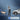 Detection boxes around a dog, a person and a car with a person alert notification