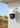 White and black TrackMix LTE with two antennas and dual lenses, mounted on an outside wall