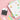 White M50 next to a notebook covered in printed white, pink, yellow and green labels