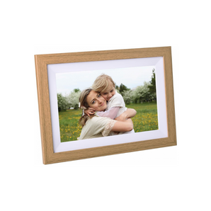 Kodak RCF-1012W at an angle, light wood-colour frame with white mat, showing a mother hugging her child
