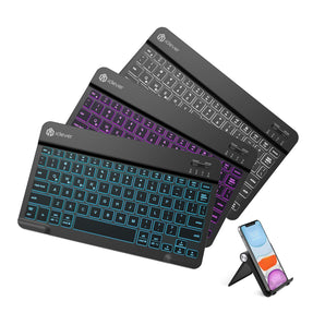 Three iClever BK04 keyboards lit in teal, purple and white, with a phone on a folding stand