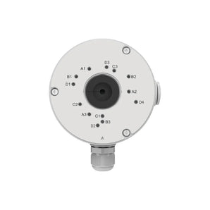 白色圓形 Reolink Junction Box B10，底座標有字母孔位，下方有電纜接頭