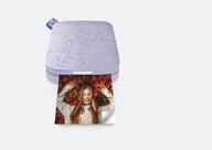 Lilac HP Sprocket 200 with a speckled top, a sticky-backed photo print coming out of the front