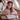 Girl drawing on a plane wearing pink BTH20, captioned dual noise reduction modes