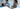 EZVIZ cloud playback icon over a family laughing together in a kitchen